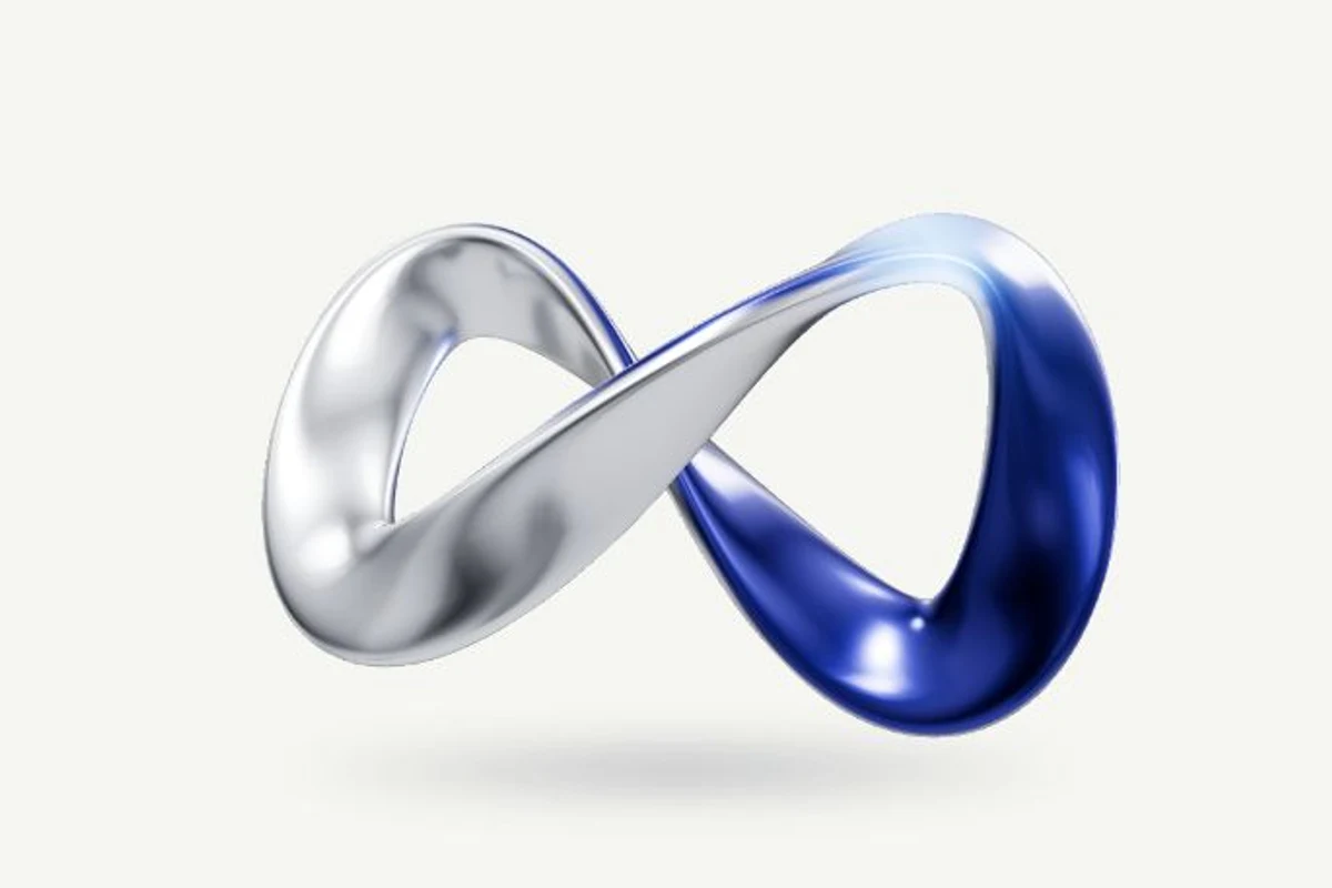 A blue and silver infinity ribbon representing a continuous path from curiosity to creation